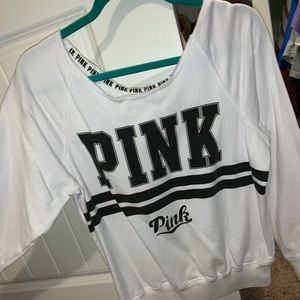 PINK brand scooped neck sweatshirt material.